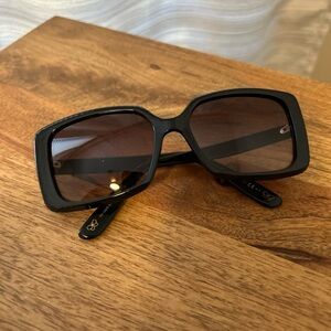 Bottega Veneta dark brown sunglasses.